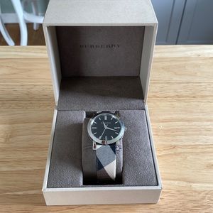 Women’s BURBERRY watch with case. Needs a battery. Great condition